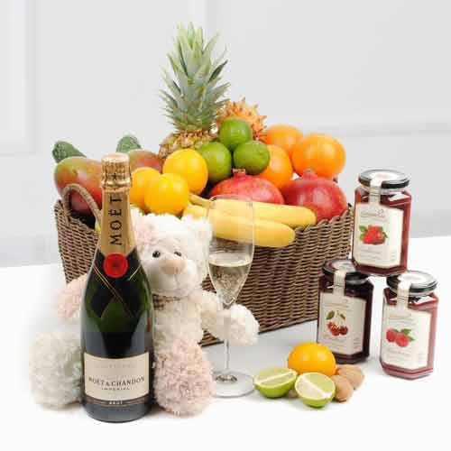 Relaxed With Fruit Basket And Champagne-Best Gifts For Expecting Parents