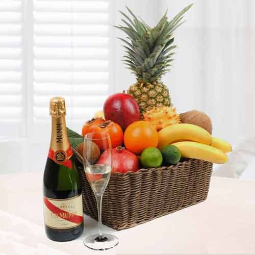 A Hefty Fruit Basket And  Champagne