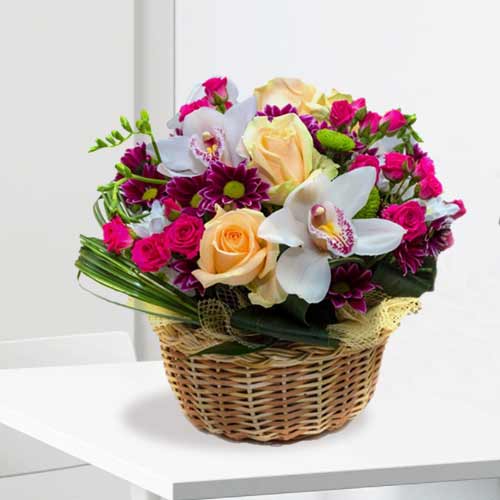 Colorful Flowers In A Basket